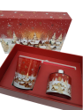 Pacchetto regalo natalizio con candela e profumatore